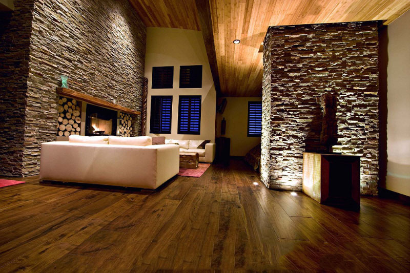 دکوراسیون با سنگ آنتیک و دکوراتیو natural living room design with exposed stone wall دکوراسیون با سنگ آنتیک و دکوراتیو